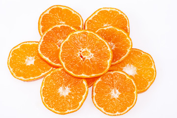 some slices of clementine fruit isolated on white background