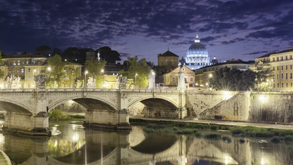 Night view of the dome of the Vatican with clouds, Rome, Italy