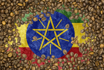 Flag of Ethiopia under a roasted coffee beans background texture
