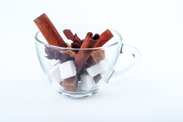 cubes of sugar and spices in a cup