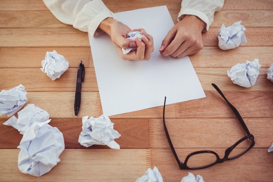 Cropped Image Of Woman With Crumpled Paper 