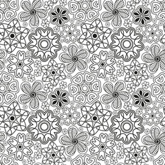 Seamless pattern in Indian style.  Ethnic ornament with flowers and paisleys in black and white colors.