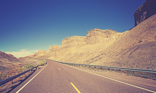 Vintage toned country highway, Utah State, USA