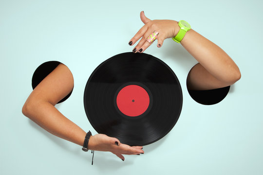 Vinyl in a female hands