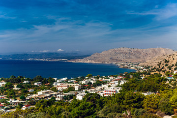 Fototapeta na wymiar Greece, island Rhodes. Top view to the sea and village Pefkos