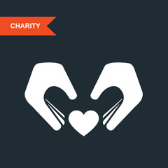 Fototapeta premium Charity and guardianship concept - hands with heart