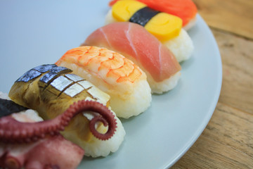 Maki Sushi set on wooden background