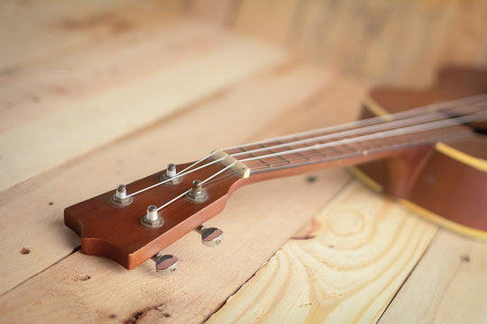ukulele on the wooden floor