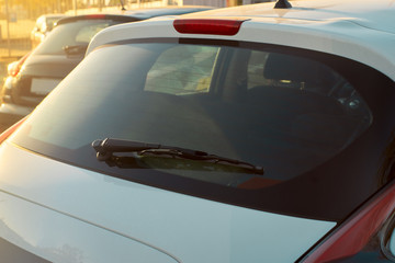The white car rear wipers - obrazy, fototapety, plakaty