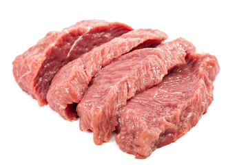 Fresh raw meat on a white background.