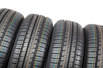 Car tires on white background.