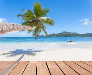 Fotobehang cocotier penché et ponton sur plage des Seychelles  © Unclesam