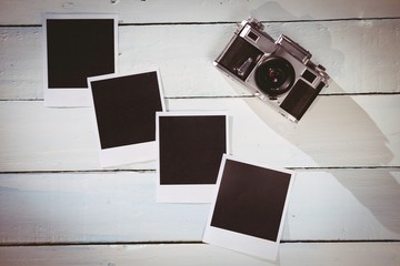 Instant photos on wooden floor