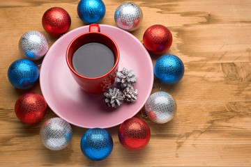 Christmas toys and coffee on the wooden table