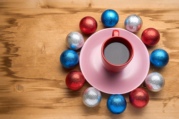 Christmas toys and coffee on the wooden table