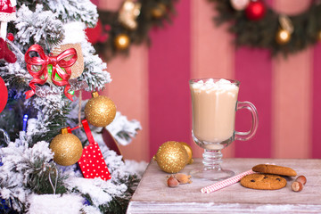 Hot cacao with marshmallows on Christmas background