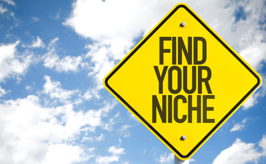 Find Your Niche sign with sky background