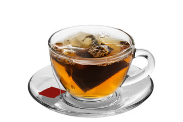A cup of tea with tea bag, on white background