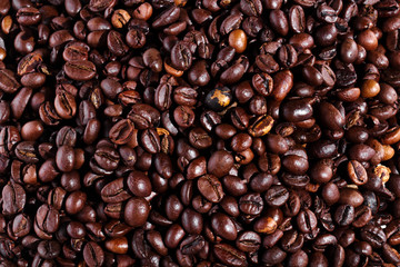 Background with many roasted coffee beans