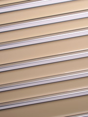 Silver and beige slat background angled right up, Australia 2016
