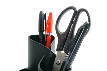 pens and other stationery on white