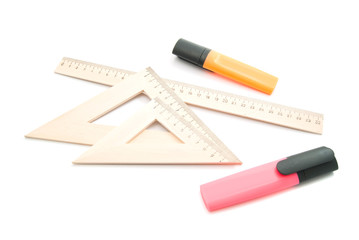 markers and wooden ruler