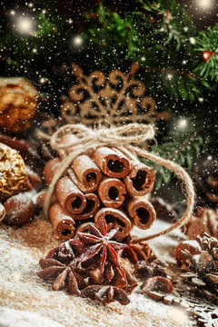 Star anise on a snowy background Christmas decoration with cinna