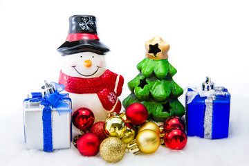 Snow man with gifts on white background
