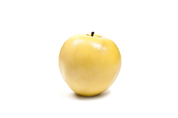 Fresh yellow apple on a white background