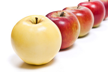 Group of ripe apples on a white background