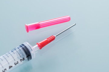 Detail of syringe with needle ready for use