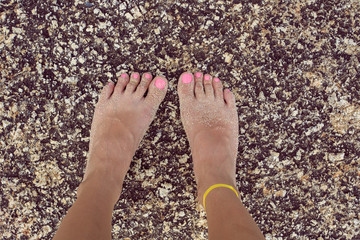 Beautiful feet on stone in Thailand.