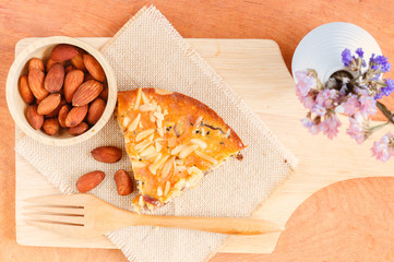 Granola bars and forks on wooden pad