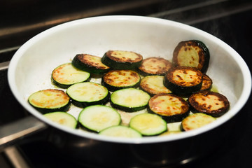 Sauteed organic zucchini squash in a frying pan