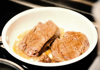 Beef steak in pan