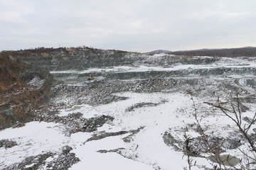 Pit on production of a construction stone in the open way,Novosibirsk region, Russia

