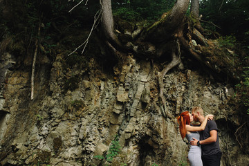 beautiful couple on the background of forest