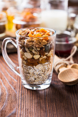 Healthy morning muesli in glass cup