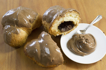 Croissants Filled With Cream And Walnuts,Melted Chocolate On Top