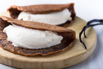 Chocolate crepes with cream