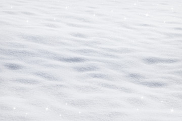 Abstract beautiful fresh sunny bright snow texture detail with sparkle copy space background. Selective focus used.