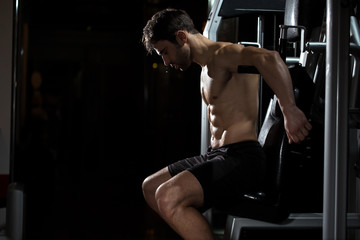 Fitness man in Gym resting