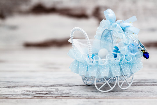 Blue Toy Baby Carriage Prepared as a Gift for Baby Shower