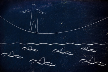 man walking on tightrope over a sea full of sharks