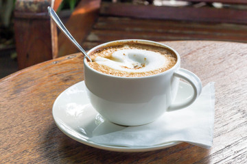 Hot cappuccino on the table