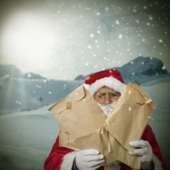 Santa Claus in the snow with letters