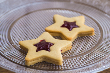 Star shaped jam and butter cookies, christmas