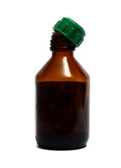 a small brown bottle for medicines on a white background