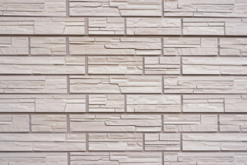 A decorative stone artificial covering. Look directly.