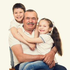Grandfather and grandchildren portrait